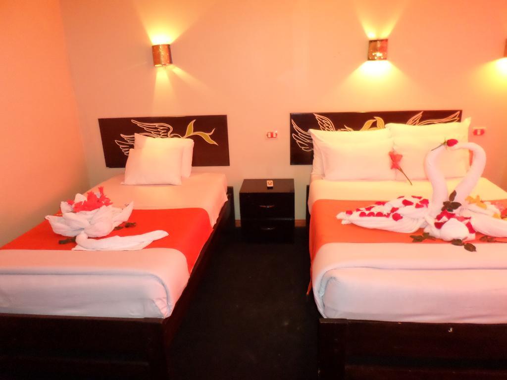 Hotel New Day Machu Picchu à Aguas Calientes Chambre photo